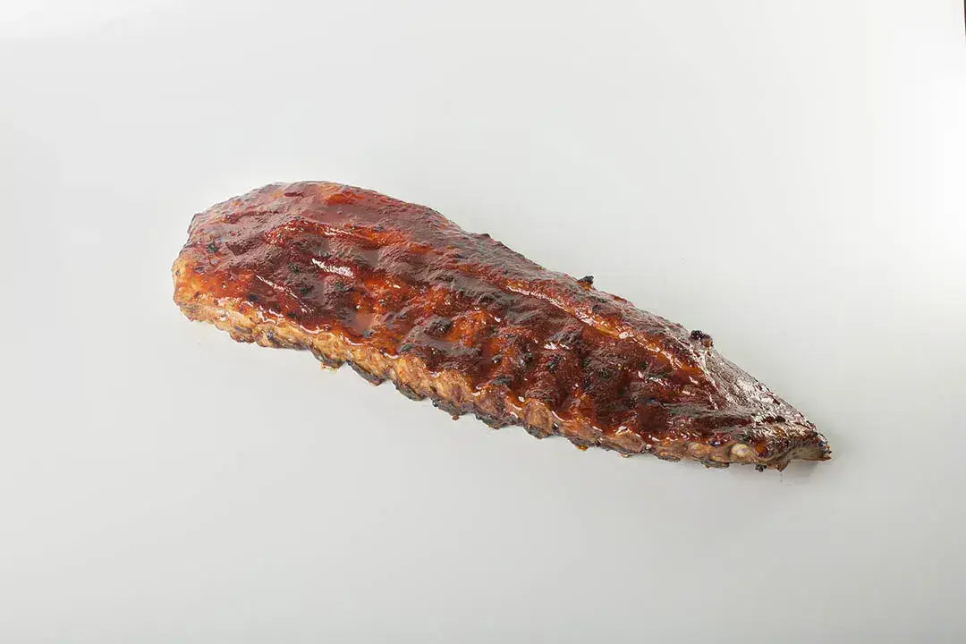 Costillar Lion de cerdo Duroc con salsa bbq Regenerado Costillar Lion de cerdo Duroc con salsa bbq Regenerado